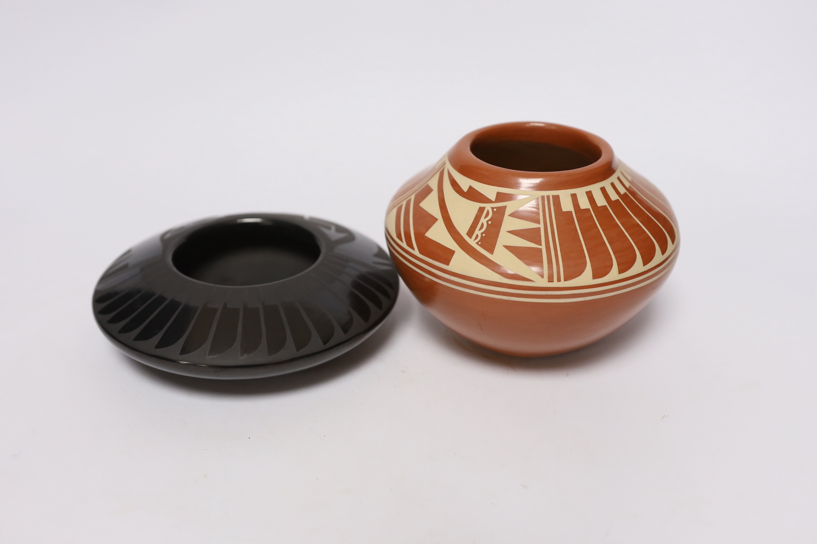 Two North American studio pottery vessels; a Marvin and Frances Martinez pottery bowl and a Kathy Gutierrez burnished bowl, tallest 10cm